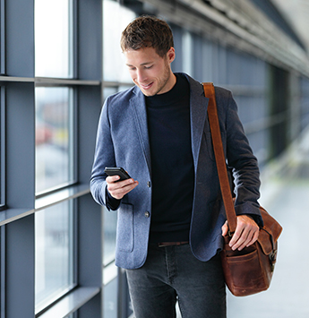 Man Walkin gWith Phone