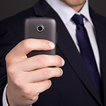 Business man holding a phone