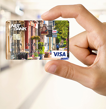 Debit Card between two fingers