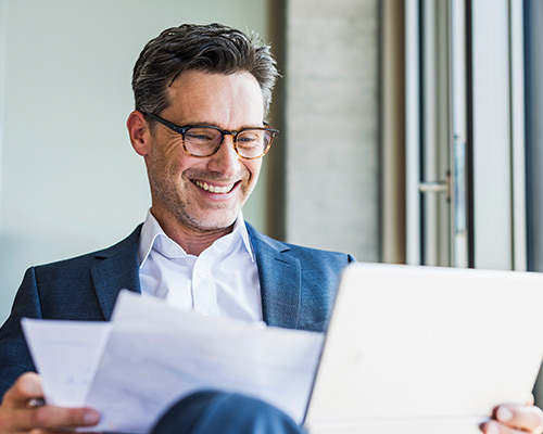 Business man reviewing paperwork