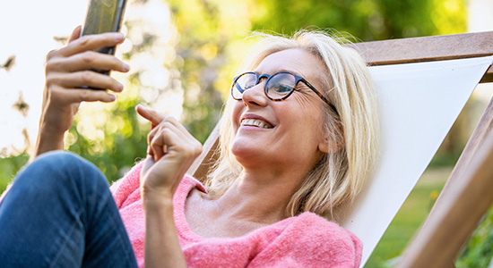 Woman relaxing in lawn chair