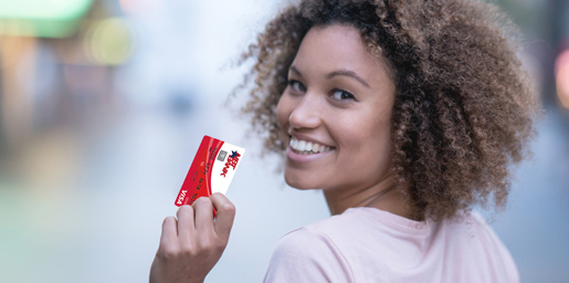 Young woman with NBT Bank Debit Card